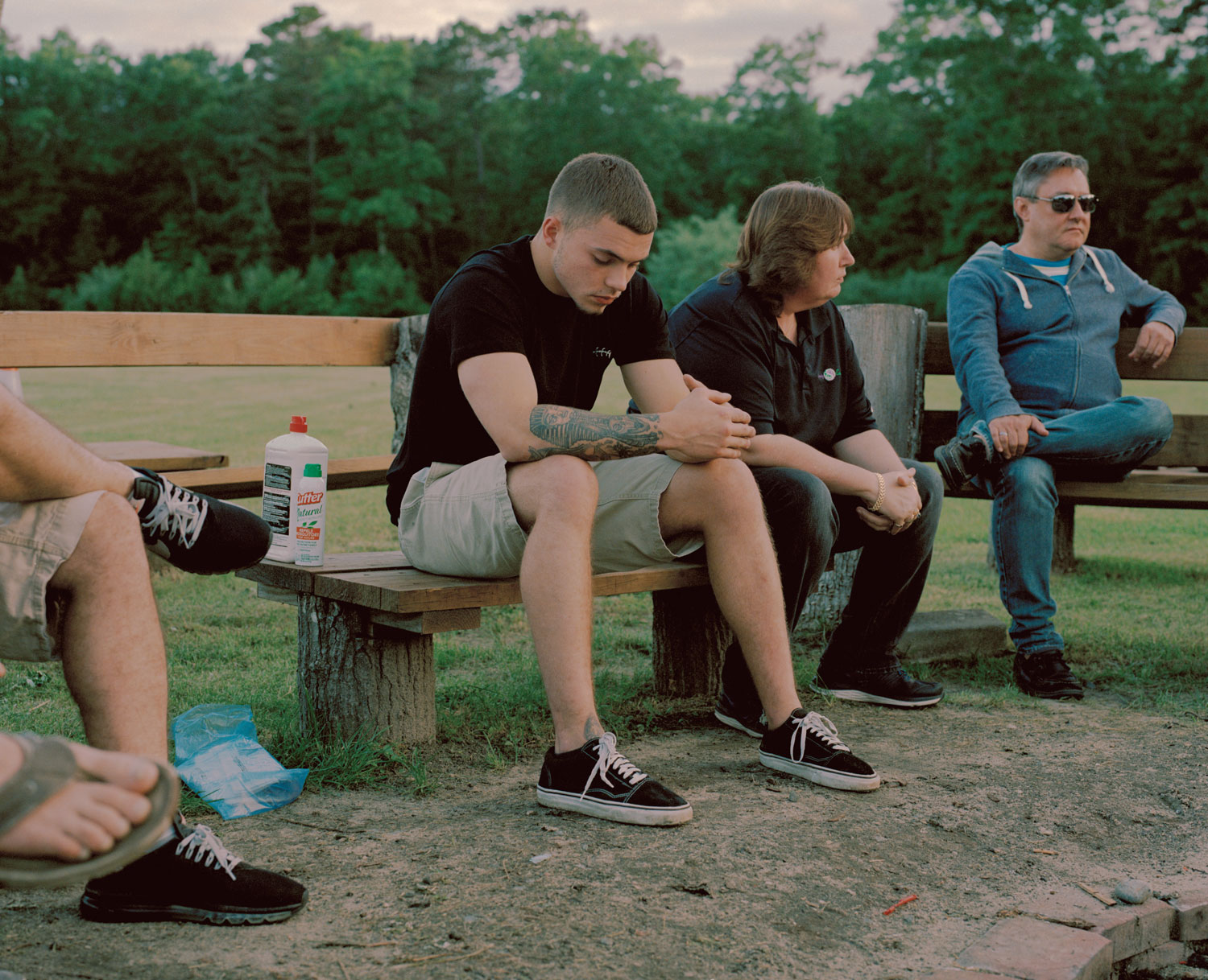 In what’s known as a “bonfire meeting,” those in recovery share stories of their progress around the flames as the sun sets in south New Jersey. Ian, pictured above, said he’s still getting used to what it means to be sober.